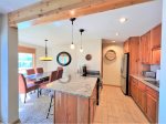 Beautiful fully equipped kitchen with anything you will need and an inviting dining room with Lake, Mtn. views